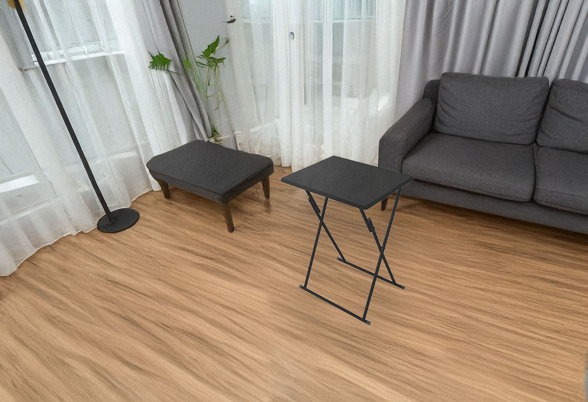 Το τραπέζι Mango ανοιχτό σε έναν χώρο σαλονιού.